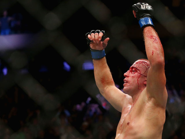GSP chokes Bisping out, wins UFC middleweight title in return