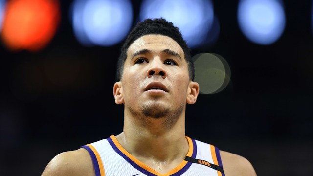 Booker joins exclusive company as 4th youngest to reach 3,000 points