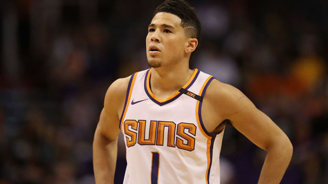 Devin Booker carried off floor after suffering adductor strain