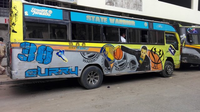 Bus in Kenya covered with Steph Curry images