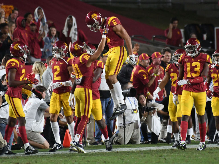 Watch: USC returns punt for TD after UCLA covers wrong side of field ...