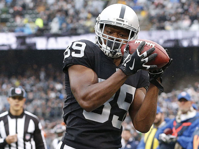 Report: Raiders' Cooper suffered sprained ankle on concussion play