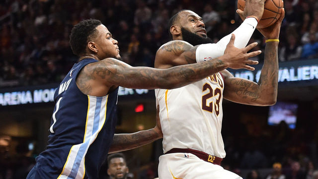 James leads Cavaliers to 11th straight win as Grizzlies lose 11th in a row