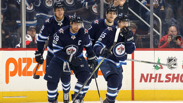 Wheeler takes over NHL assist lead with 4-point night