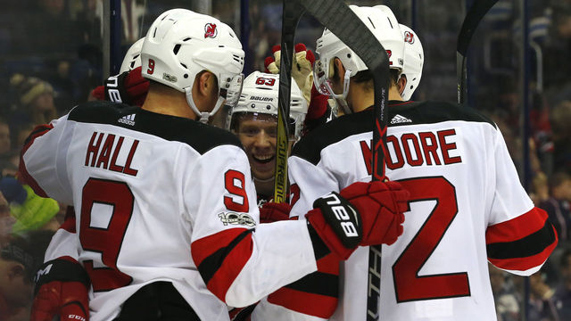 Devils jump into 1st place in Metro with win over Blue Jackets