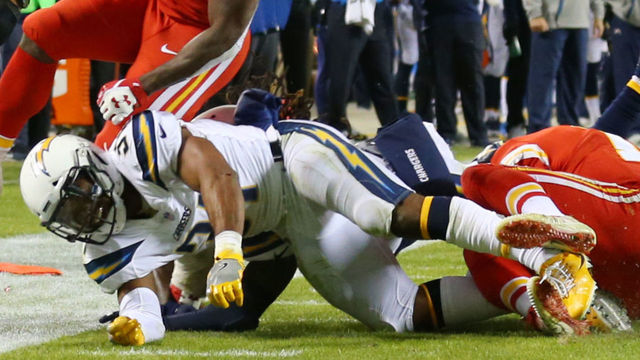 Wife of Chargers' Adrian Phillips leaves stands to visit injured husband
