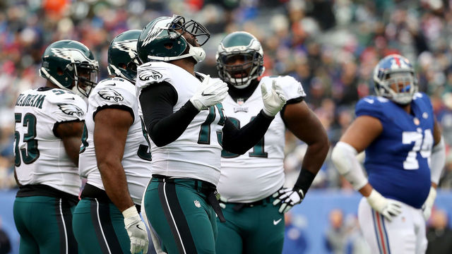 Eagles secure 1st-round playoff bye with win over Giants