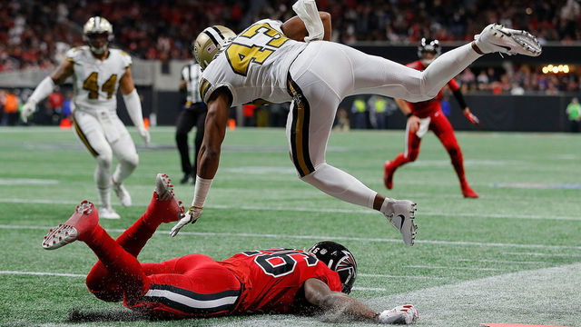 ATLANTA, GA - DECEMBER 07: Marcus Williams #43 of the New Orleans Saints is upended by Tevin Coleman #26 of the Atlanta Falcons after an interception at Mercedes-Benz Stadium on December 7, 2017 in Atlanta, Georgia. (Photo by Kevin C. Cox/Getty Images)