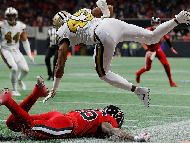 ATLANTA, GA - DECEMBER 07: Marcus Williams #43 of the New Orleans Saints is upended by Tevin Coleman #26 of the Atlanta Falcons after an interception at Mercedes-Benz Stadium on December 7, 2017 in Atlanta, Georgia. (Photo by Kevin C. Cox/Getty Images)