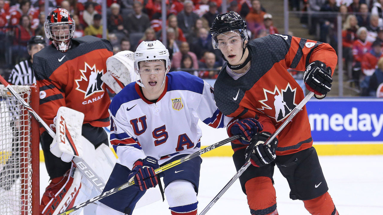 TORONTO,ON - DECEMBER 31: Joey Anderson #13 of Team USA skates against Philippe Myers #6 of Team Canada during a preliminary round game in the 2017 IIHF World Junior Hockey Championship at the Air Canada Centre on December 31, 2016 in Toronto, Ontario, Canada. The USA defeated Canada 3-1. (Photo by Claus Andersen/Getty Images)