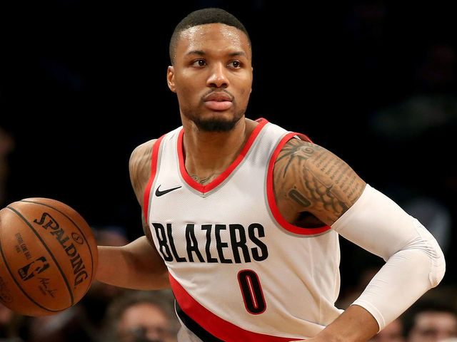 NEW YORK, NY - NOVEMBER 24: Damian Lillard #0 of the Portland Trail Blazers drives to the basket in the third quarter against the Brooklyn Nets at Barclays Center on November 24, 2017 in the Brooklyn borough of New York City. (Photo by Abbie Parr/Getty Images)