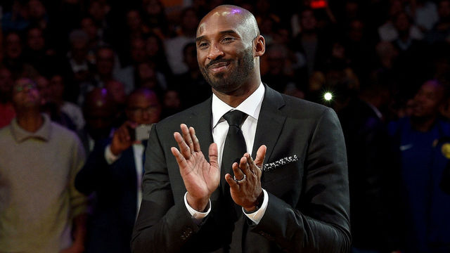 LOS ANGELES, CA - DECEMBER 18: Kobe Bryant smiles at halftime as both his #8 and #24 Los Angeles Lakers jerseys are retired at Staples Center on December 18, 2017 in Los Angeles, California. (Photo by Kevork Djansezian/Getty Images)