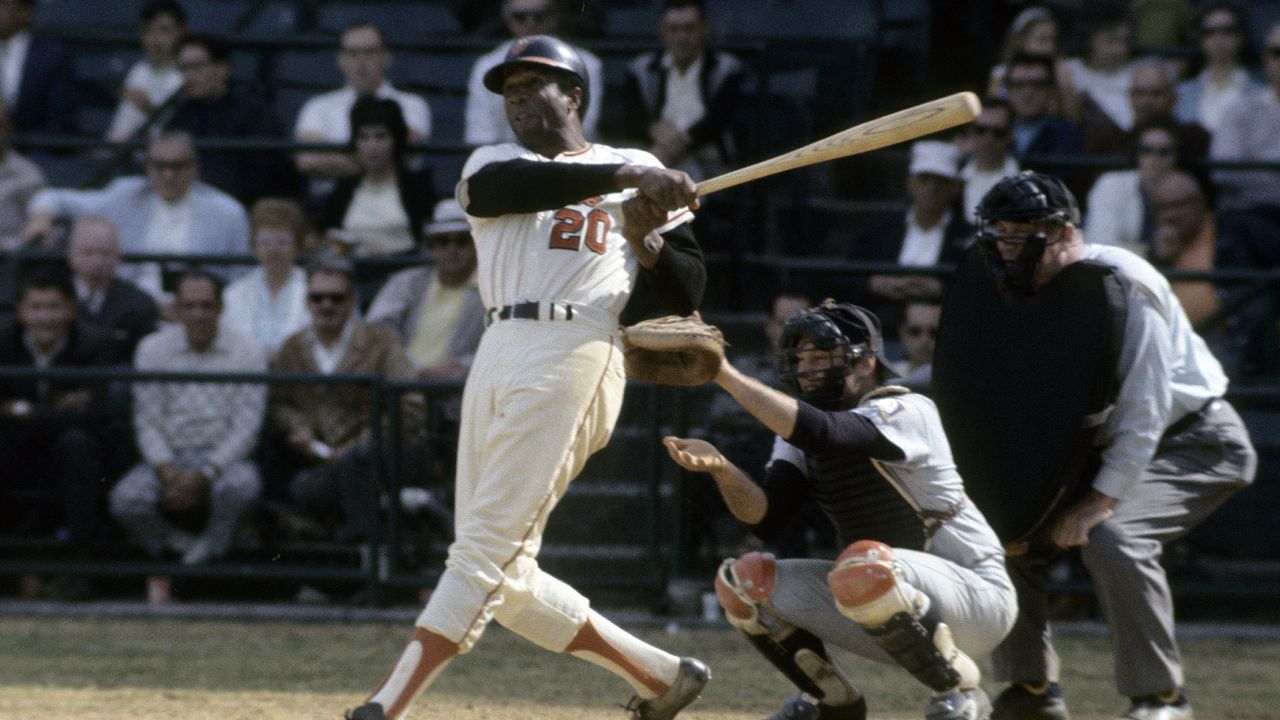 BALTIMORE, MD - CIRCA 1960s: Outfielder Frank Robinson #20 of the Baltimore Orioles swings and watches the flight of his ball during a circa late 1960s Major League Baseball game at Memorial Stadium in Baltimore, Maryland. Robinson played for the Orioles from 1966-71. (Photo by Focus on Sport/Getty Images)