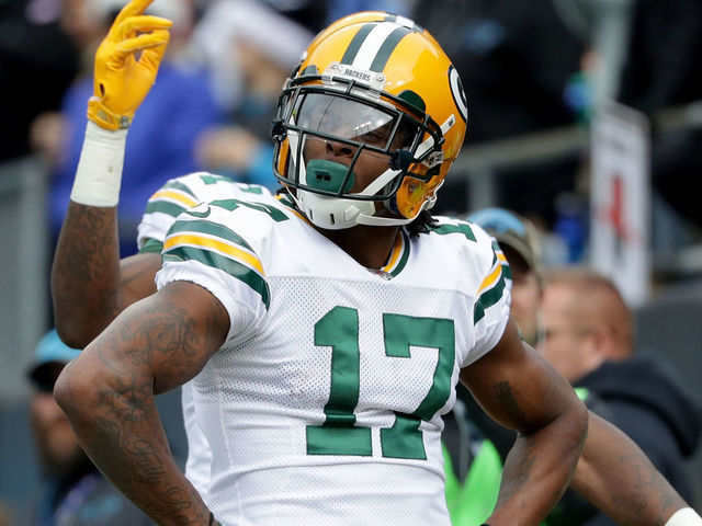 CHARLOTTE, NC - DECEMBER 17: Davante Adams #17 of the Green Bay Packers reacts after scoring a touchdown against the Carolina Panthers in the first quarter during their game at Bank of America Stadium on December 17, 2017 in Charlotte, North Carolina. (Photo by Streeter Lecka/Getty Images)