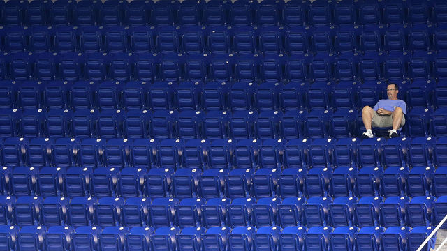 MIAMI, FL - SEPTEMBER 23: A Miami Marlins fan watches during a game against the Philadelphia Phillies at Marlins Park on September 23, 2015 in Miami, Florida. (Photo by Mike Ehrmann/Getty Images)