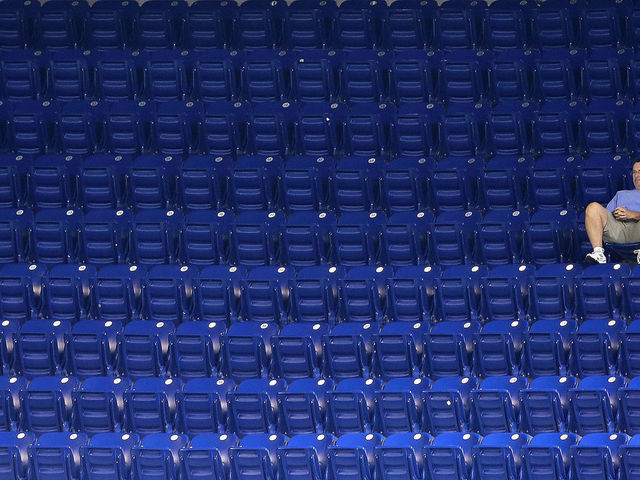 MIAMI, FL - SEPTEMBER 23: A Miami Marlins fan watches during a game against the Philadelphia Phillies at Marlins Park on September 23, 2015 in Miami, Florida. (Photo by Mike Ehrmann/Getty Images)