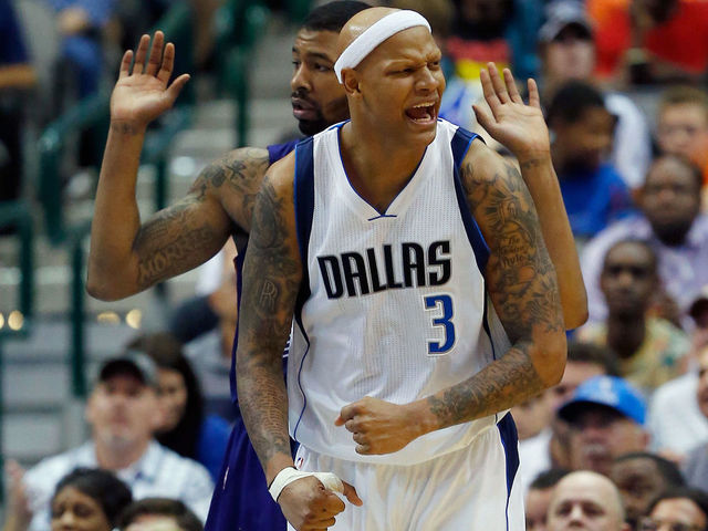DALLAS, TX - APRIL 08: Charlie Villanueva #3 of the Dallas Mavericks celebrates after drawing a foul from Markieff Morris #11 of the Phoenix Suns in the second half at American Airlines Center on April 8, 2015 in Dallas, Texas. (Photo by Tom Pennington/Getty Images)