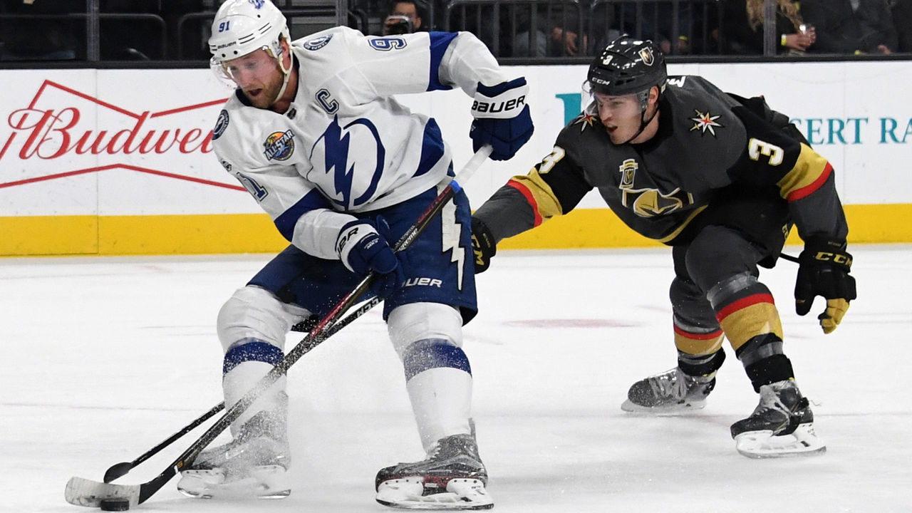 LAS VEGAS, NV - DECEMBER 19: Steven Stamkos #91 of the Tampa Bay Lightning skates with the puck ahead of Brayden McNabb #3 of the Vegas Golden Knights in the first period of their game at T-Mobile Arena on December 19, 2017 in Las Vegas, Nevada. (Photo by Ethan Miller/Getty Images)