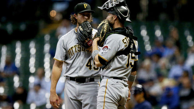 MILWAUKEE, WI - SEPTEMBER 12: Gerrit Cole #45 and Chris Stewart #19 of the Pittsburgh Pirates meet in the third inning against the Milwaukee Brewers at Miller Park on September 12, 2017 in Milwaukee, Wisconsin. (Photo by Dylan Buell/Getty Images)