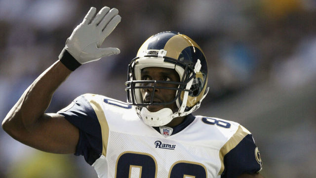 SEATTLE - SEPTEMBER 21: Wide Receiver Isaac Bruce #80 of the St. Louis Rams reacts after scoring a touchdown against the Seattle Seahawks at Seahawks Stadium on September 21, 2003 in Seattle, Washington. The Seahawks defeated the Rams 24-23.