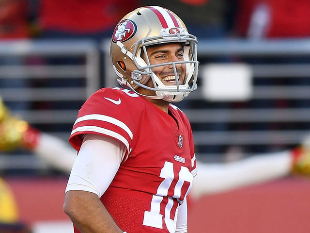 SANTA CLARA, CA - DECEMBER 17: Jimmy Garoppolo #10 of the San Francisco 49ers celebrates after throwing a touchdown pass to Garrett Celek #88 against the Tennessee Titans during their NFL football game at Levi's Stadium on December 17, 2017 in Santa Clara, California.