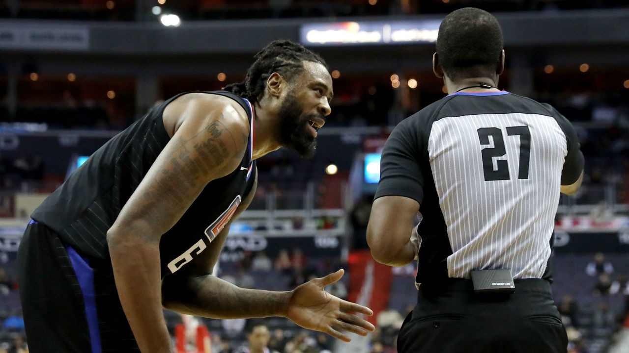 WASHINGTON, DC - DECEMBER 15: DeAndre Jordan #6 of the LA Clippers talks with referee Mitchell Ervin #27 after being called for a foul against the Washington Wizards in the first half at Capital One Arena on December 15, 2017 in Washington, DC.