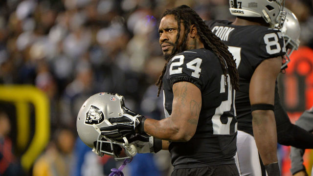 OAKLAND, CA - DECEMBER 17: Marshawn Lynch #24 of the Oakland Raiders looks on during their NFL game against the Dallas Cowboys at Oakland-Alameda County Coliseum on December 17, 2017 in Oakland, California.