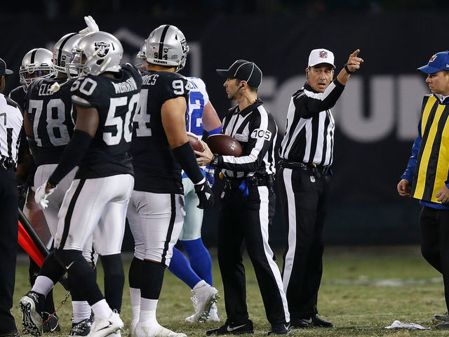 OAKLAND, CA - DECEMBER 17: Referee Gene Steratore #114 calls first down to Dallas during the game against the Oakland Raiders at Oakland-Alameda County Coliseum on December 17, 2017 in Oakland, California.
