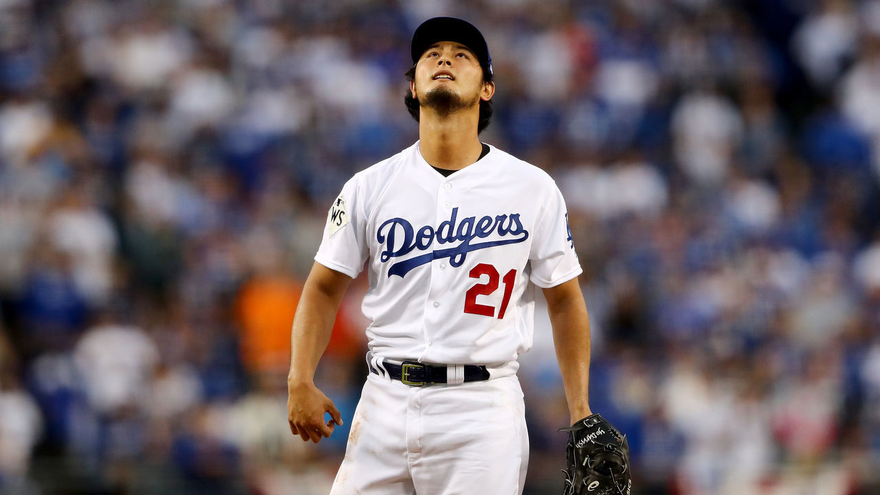 LOS ANGELES, CA - NOVEMBER 01: Yu Darvish #21 of the Los Angeles Dodgers reacts in the first inning against the Houston Astros in game seven of the 2017 World Series at Dodger Stadium on November 1, 2017 in Los Angeles, California.