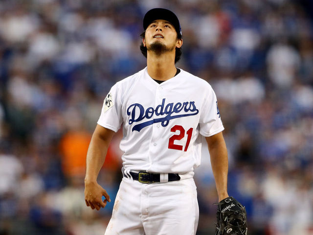 LOS ANGELES, CA - NOVEMBER 01: Yu Darvish #21 of the Los Angeles Dodgers reacts in the first inning against the Houston Astros in game seven of the 2017 World Series at Dodger Stadium on November 1, 2017 in Los Angeles, California.