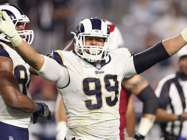 GLENDALE, AZ - DECEMBER 03: Defensive end Aaron Donald #99 of the Los Angeles Rams reacts after a tackle against the Arizona Cardinals during the second half of the NFL game at the University of Phoenix Stadium on December 3, 2017 in Glendale, Arizona. The Rams defeated the Cardinals 32-16.
