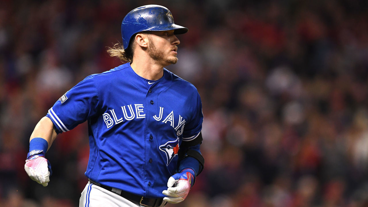 CLEVELAND, OH - OCTOBER 14: Josh Donaldson #20 of the Toronto Blue Jays runs out a single in the eighth inning against the Cleveland Indians during game one of the American League Championship Series at Progressive Field on October 14, 2016 in Cleveland, Ohio.