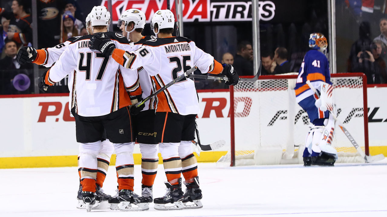 NEW YORK, NEW YORK - DECEMBER 21: Hampus Lindholm #47 of the Anaheim Ducks celebrates his goal in the second period against Jaroslav Halak #41 of the Anaheim Ducks during their game at Barclays Center on December 21, 2017 in New York City.