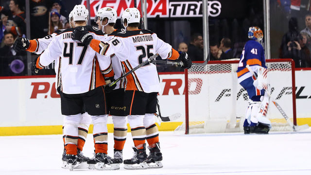 NEW YORK, NEW YORK - DECEMBER 21: Hampus Lindholm #47 of the Anaheim Ducks celebrates his goal in the second period against Jaroslav Halak #41 of the Anaheim Ducks during their game at Barclays Center on December 21, 2017 in New York City.