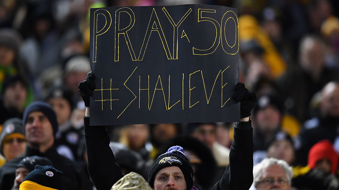 PITTSBURGH, PA - DECEMBER 10: A Baltimore Ravens fan holds up a sign honoring Ryan Shazier #50 of the Pittsburgh Steelers who was injured in a game last week during the game at Heinz Field on December 10, 2017 in Pittsburgh, Pennsylvania.