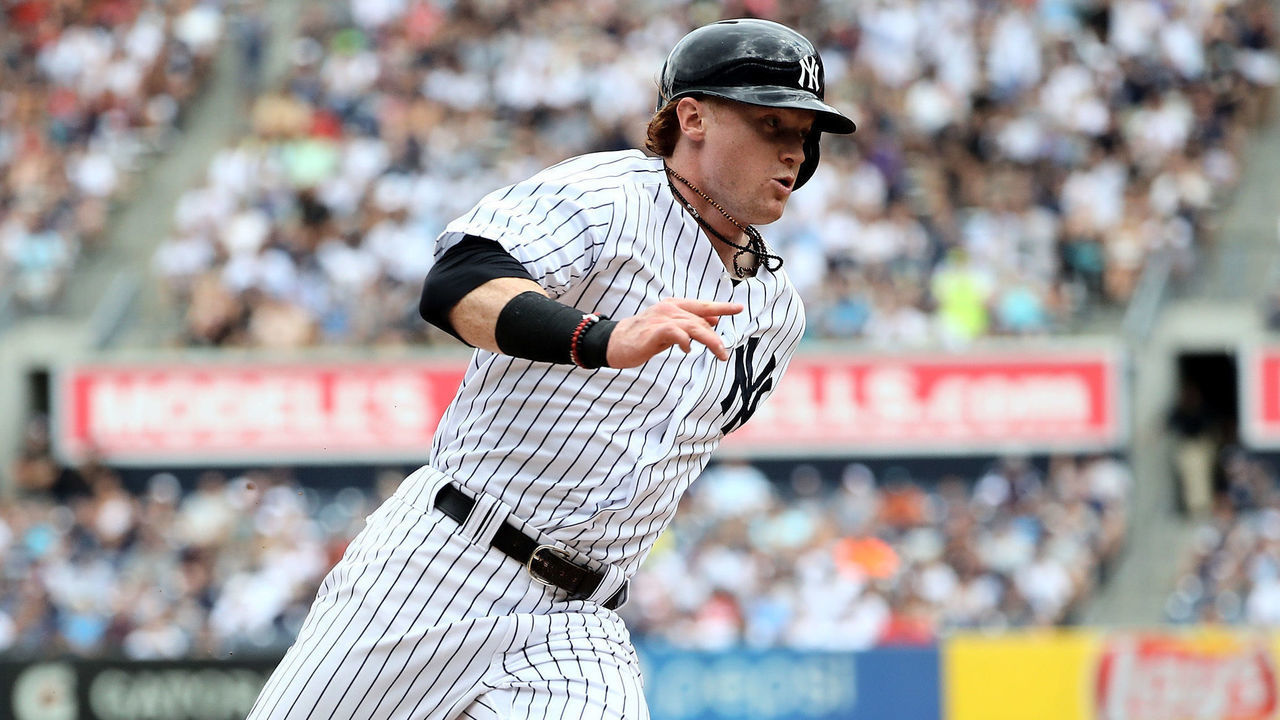 NEW YORK, NY - JULY 26: Clint Frazier #77 of the New York Yankees rounds third and heads for home in the seventh inning against the Cincinnati Reds on July 26, 2017 at Yankee Stadium in the Bronx borough of New York City.