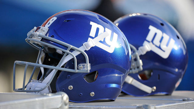 NASHVILLE, TN - DECEMBER 07: Helmets of the New York Giants rests on the sideline during a game against the Tennessee Titans at LP Field on December 7, 2014 in Nashville, Tennessee.