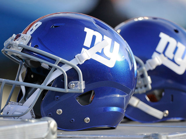 NASHVILLE, TN - DECEMBER 07: Helmets of the New York Giants rests on the sideline during a game against the Tennessee Titans at LP Field on December 7, 2014 in Nashville, Tennessee.