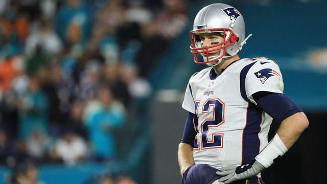 MIAMI GARDENS, FL - DECEMBER 11: Tom Brady #12 of the New England Patriots looks on in the third quarter against the Miami Dolphins at Hard Rock Stadium on December 11, 2017 in Miami Gardens, Florida.