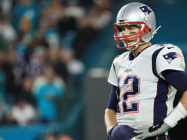 MIAMI GARDENS, FL - DECEMBER 11: Tom Brady #12 of the New England Patriots looks on in the third quarter against the Miami Dolphins at Hard Rock Stadium on December 11, 2017 in Miami Gardens, Florida.