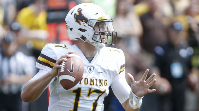 IOWA CITY, IOWA- SEPTEMBER 2: Quarterback Josh Allen #17 of the Wyoming Cowboys looks for a receiver in the third quarter against the Iowa Hawkeyes, on September 2, 2017 at Kinnick Stadium in Iowa City, Iowa.