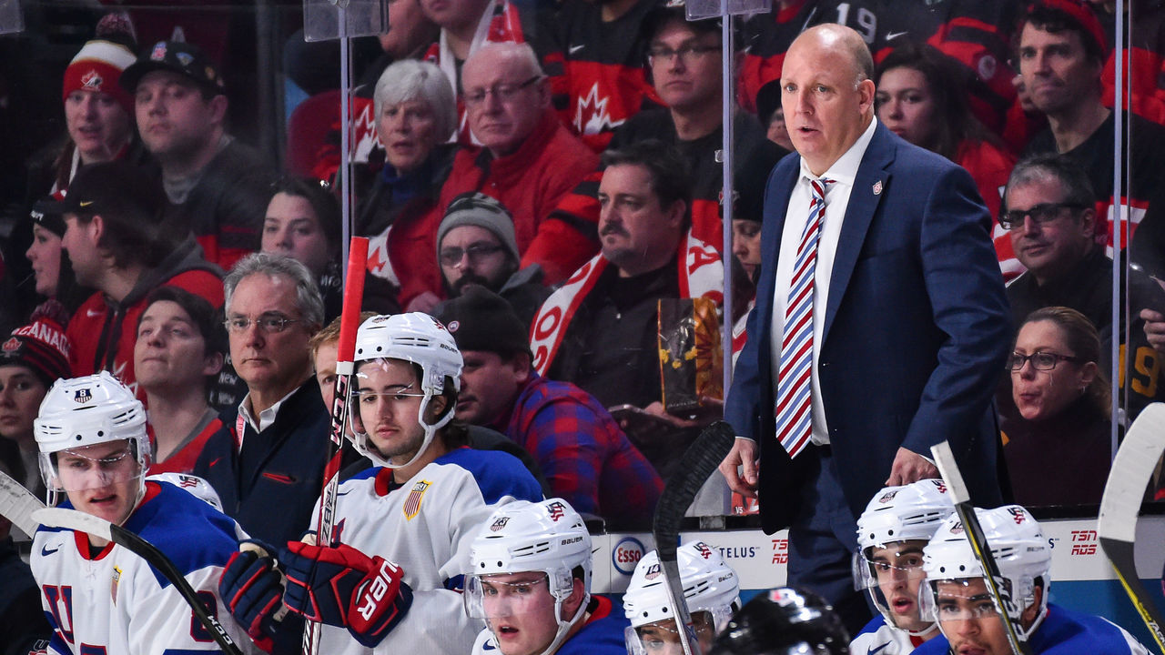 MONTREAL, QC - JANUARY 05: Head coach Bob Motzko of Team United States gets on top of the bench during the 2017 IIHF World Junior Championship gold medal game against Team Canada at the Bell Centre on January 5, 2017 in Montreal, Quebec, Canada. Team United States defeated Team Canada 5-4 in a shootout and win the gold medal round.