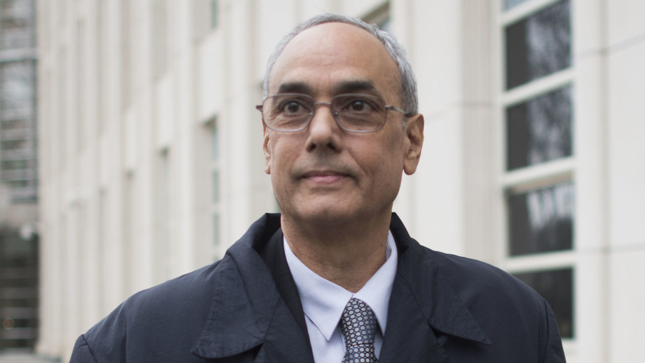 Former president of the Peruvian Football Association Manuel Burga, one of three defendants in the FIFA scandal departs the Federal Courthouse in Brooklyn on December 22, 2017 in New York. A US jury convicted two South American ex-soccer bosses of corruption but will return after Christmas to deliberate on the fate of a third defendant in the FIFA trial in New York. But the jury said they had not yet reached consensus on former Peru boss Manuel Burga, who faces one count of racketeering conspiracy. They will return to resume deliberations on Tuesday, after the Christmas holiday. / AFP PHOTO / DON EMMERT