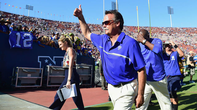 LOS ANGELES, CA - SEPTEMBER 18: Head coach Jeff Fisher of the Los Angeles Rams celebrates as he leaves the field after his team's 9-3 victory over the Seattle Seahawks in the home opening NFL game at Los Angeles Coliseum on September 18, 2016 in Los Angeles, California.