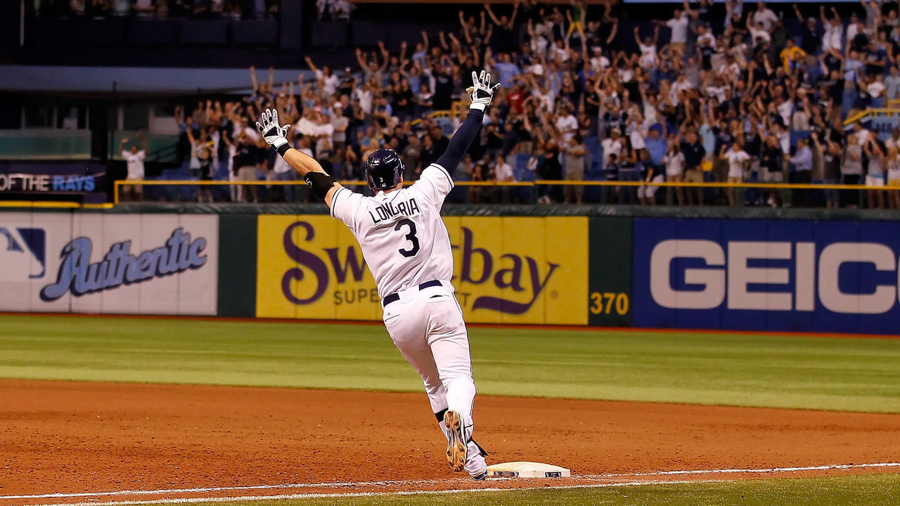 ST. PETERSBURG, FL - SEPTEMBER 28: Evan Longoria #3 of the Tampa Bay Rays rounds the bases after his game-winning walk off home run in the twelfth inning against the New York Yankees during the game at Tropicana Field on September 28, 2011 in St. Petersburg, Florida.