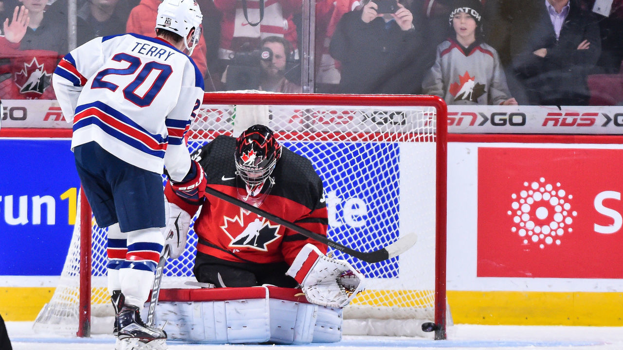 MONTREAL, QC - JANUARY 05: Troy Terry #20 of Team United States scores on goaltender Carter Hart #31 of Team Canada in a shootout during the 2017 IIHF World Junior Championship gold medal game at the Bell Centre on January 5, 2017 in Montreal, Quebec, Canada. Team United States defeats Team Canada 5-4 in a shootout and wins the gold medal round.