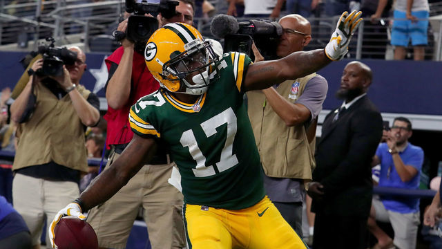 ARLINGTON, TX - OCTOBER 08: Davante Adams #17 of the Green Bay Packers celebrates after scoring the game winning touchdown against Jourdan Lewis #27 of the Dallas Cowboys in the fourth quarter at AT&T Stadium on October 8, 2017 in Arlington, Texas. The Green Bay Packers beat the Dallas Cowboys 35-31.