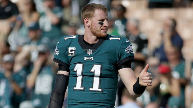 LOS ANGELES, CA - DECEMBER 10: Quarterback Carson Wentz #11 of the Philadelphia Eagles gives a thumbs up prior to the start of the game against the Los Angeles Rams at Los Angeles Memorial Coliseum on December 10, 2017 in Los Angeles, California.