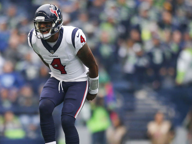 SEATTLE, WA - OCTOBER 29: Quarterback Deshaun Watson #4 of the Houston Texans jumps up after connecting with Will Fuller V #15 on a 59 yard touchdown pass during the first quarter of the game against the Seattle Seahawks at CenturyLink Field on October 29, 2017 in Seattle, Washington.
