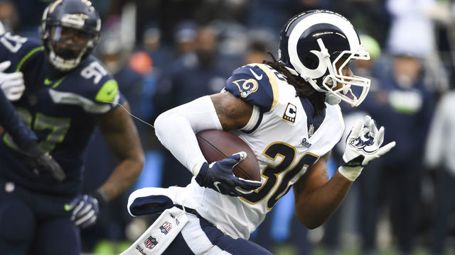 SEATTLE, WA - DECEMBER 17: Running back Todd Gurley #30 of the Los Angeles Rams rushes against the Seattle Seahawks during the 2nd quarter of the game at CenturyLink Field on December 17, 2017 in Seattle, Washington.